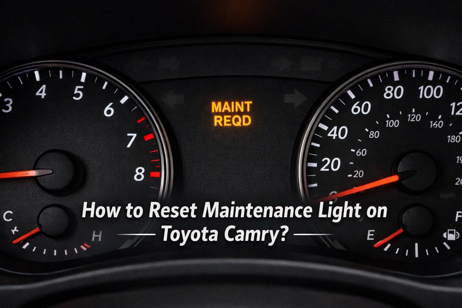 Toyota Camry dashboard with amber MAINT REQD light illuminated, showing how to reset maintenance light on Toyota Camry step by step guide.